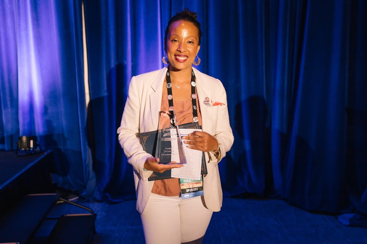 Study Abroad Manager at the Ralph J. Bunche International Affairs Center, MaRaina Montgomery, receiving the Innovation in Diversity Award” - courtesy of GoAbroad.com_. .jpg
