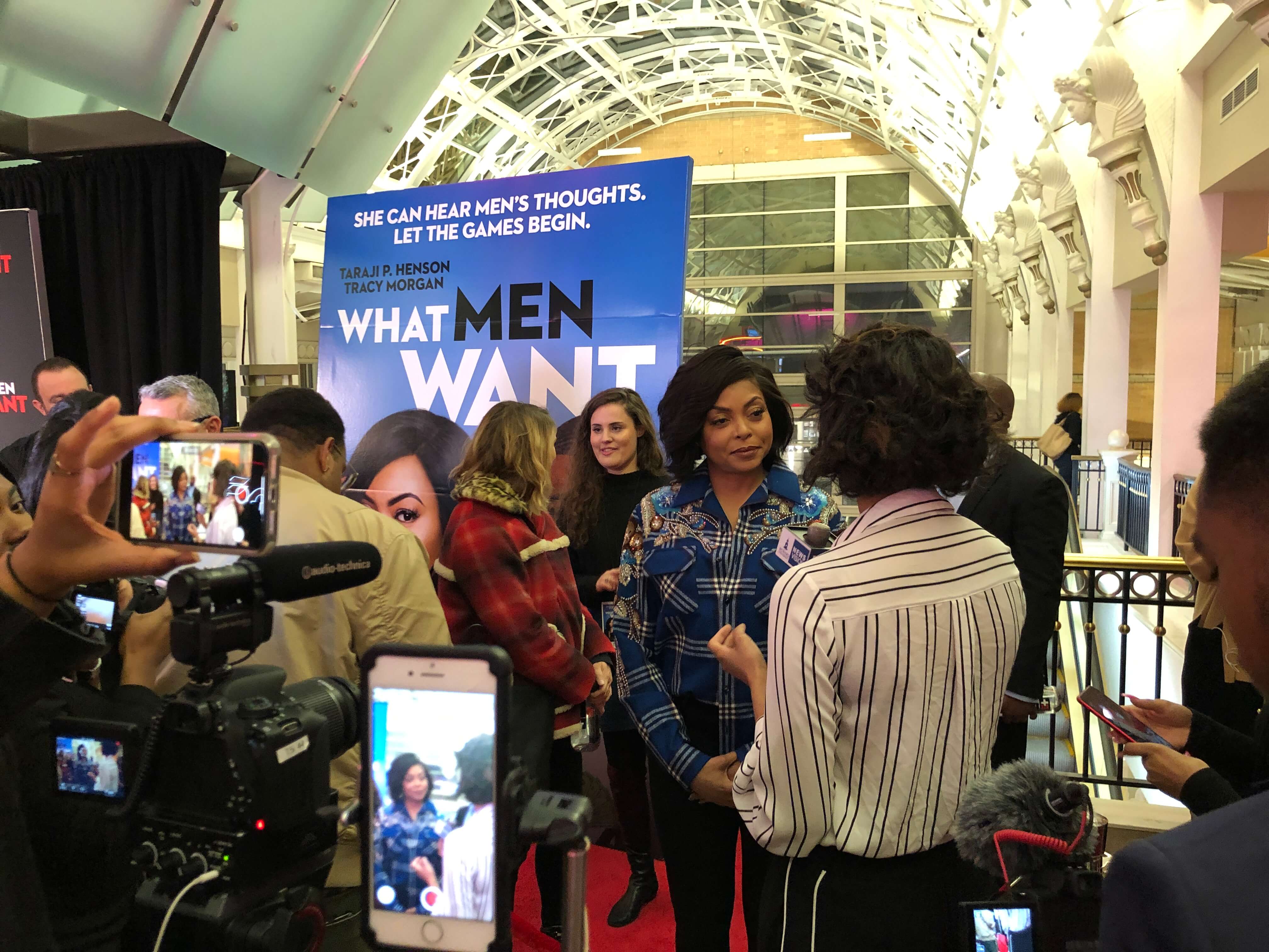 Amber Tucker, Howard University broadcast journalism student interviewing Taraji P. Henson