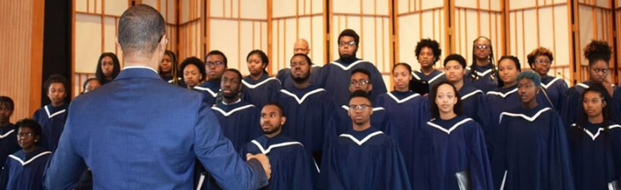 Howard University Choir sings behind choir director