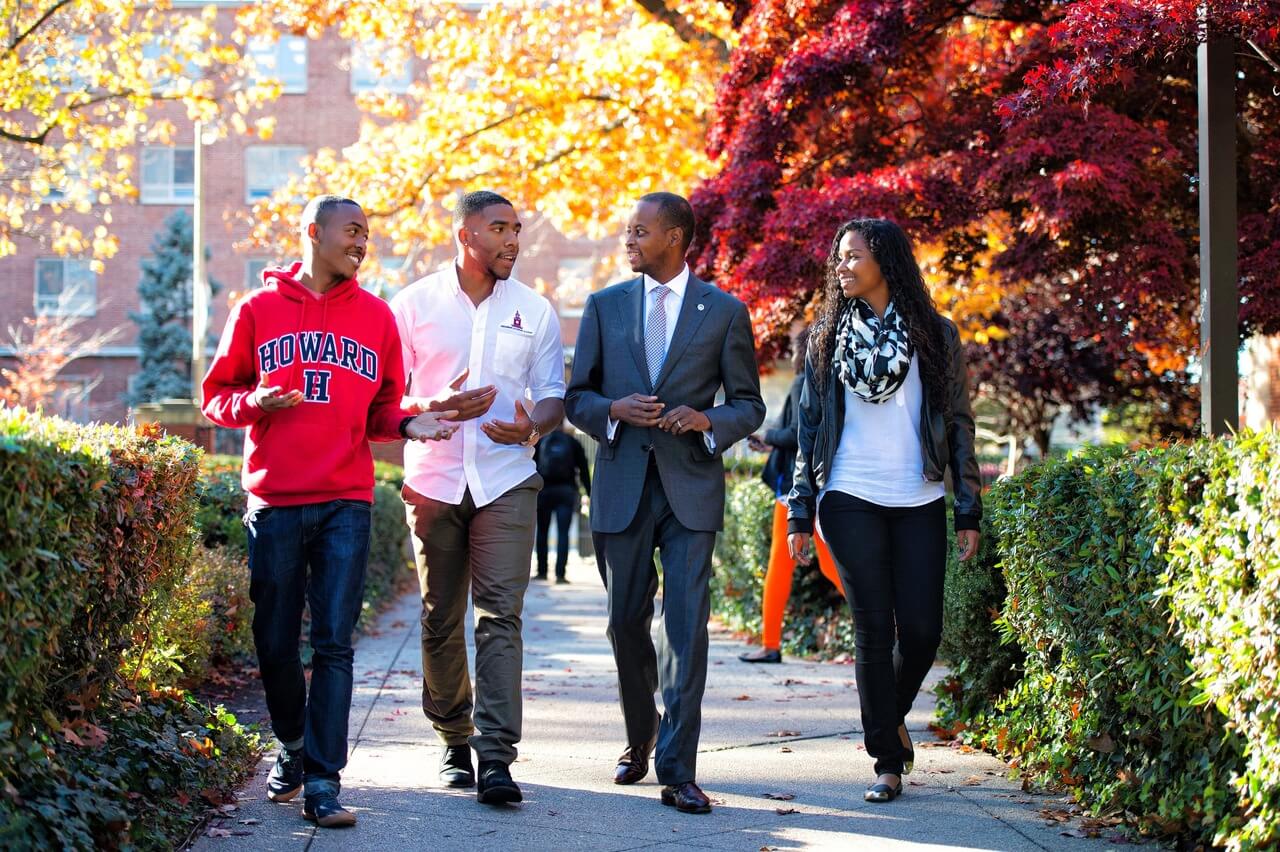 Dr. Frederick walks with Students