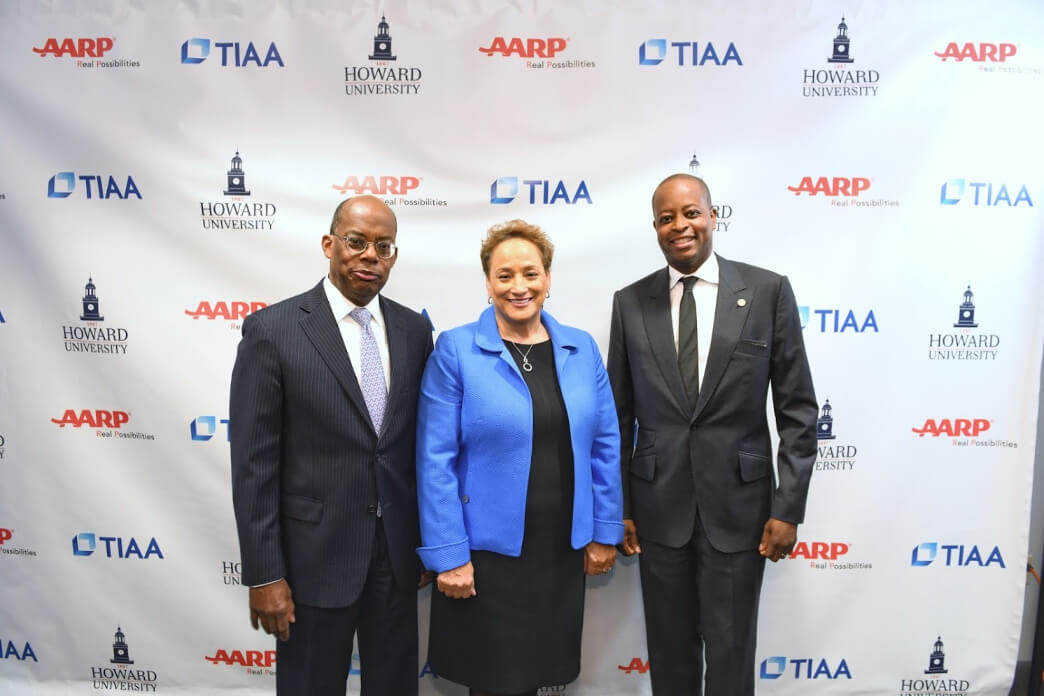 TIAA, AARP, and Howard University representatives pose for a photo