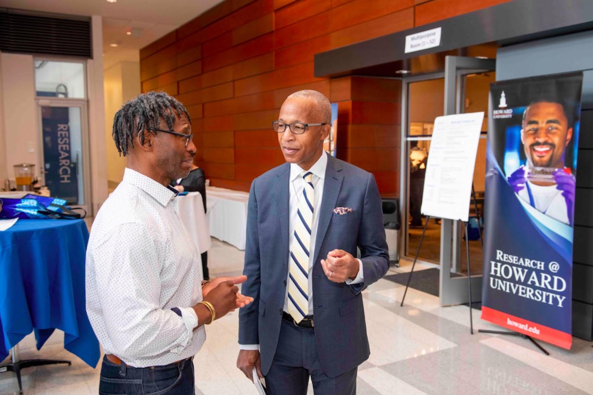Howard VP of Research chats with student