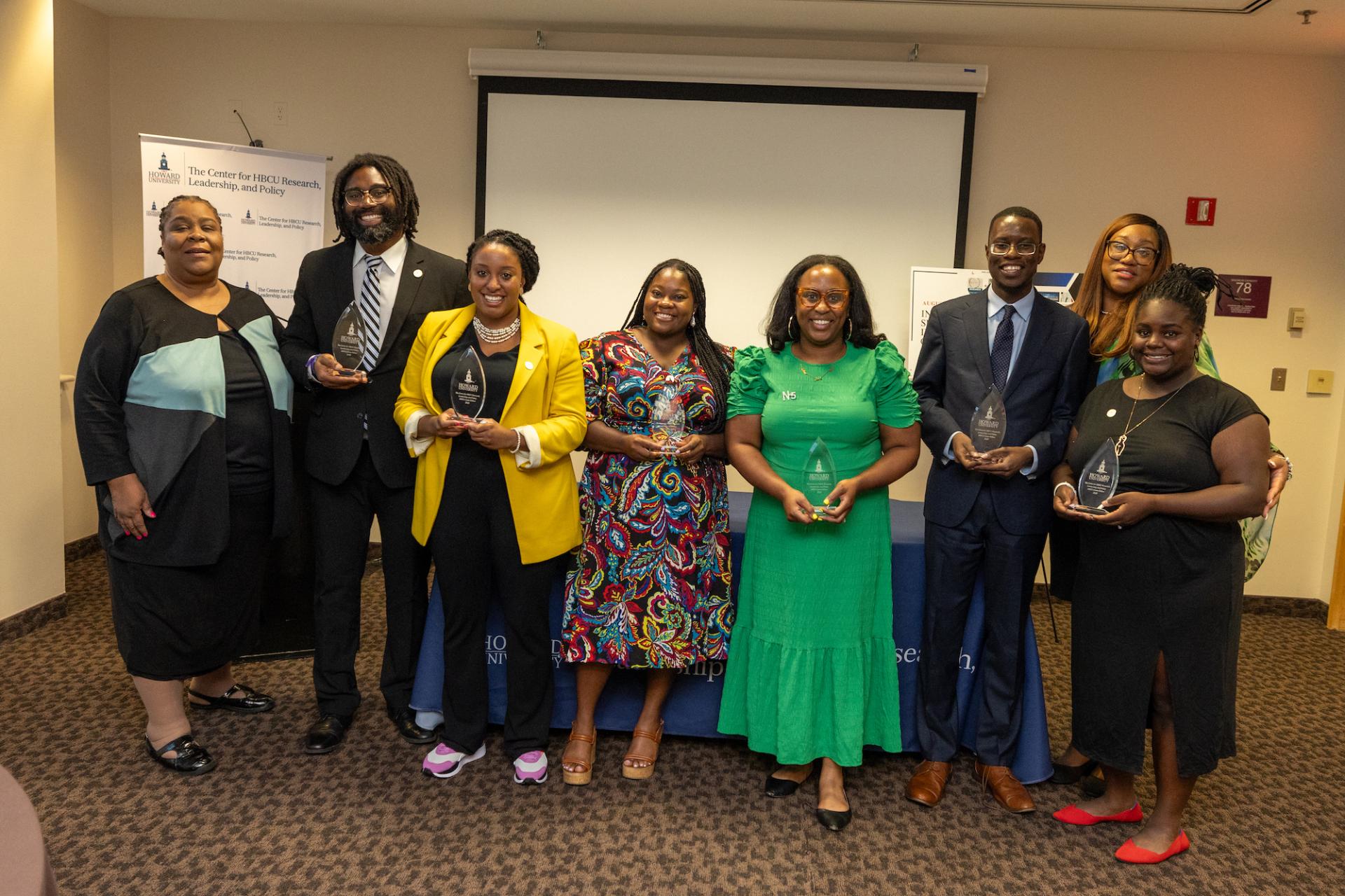Members of the inaugural class of the 2023 HBCU Center Fellows are awarded for their research work in the HBCU leadership and policy at the Inaugural Summer Invitational Conference.  Dr. Melanie Carter, J. Elijah Bratton, Stephanie Tilley, Brandy Jones, Brittani Williams, Dr. Magana Kabugi, Dr. Ebonierose Wade-Ndiaye, and Britt Spears-Rhymes