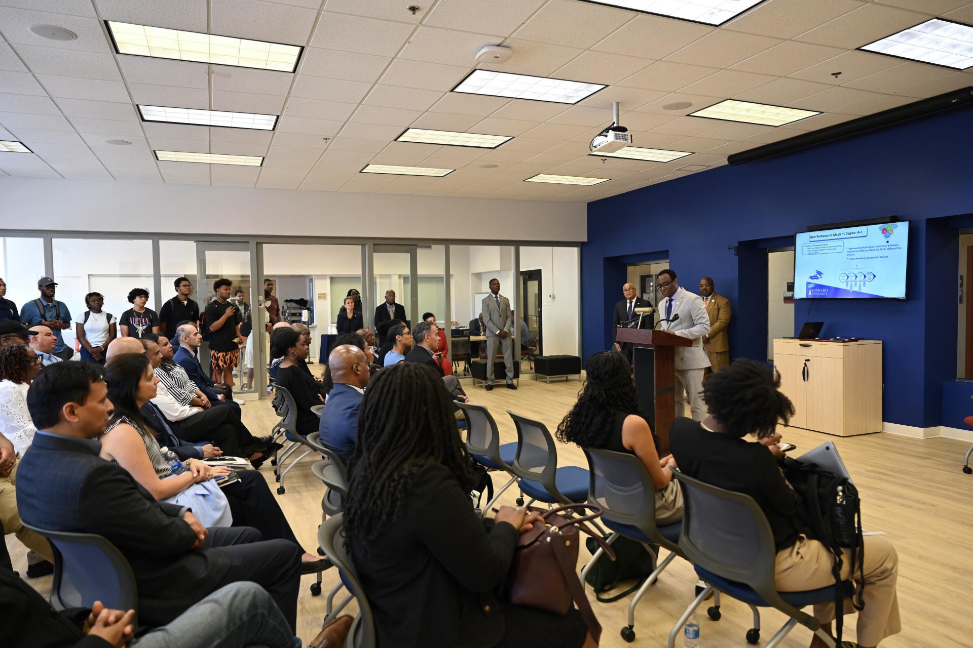 On August 21, President Ben Vinson addresses the attendees of the post-silicone lab’s ribbon-cutting ceremony. (Source: Howard University)