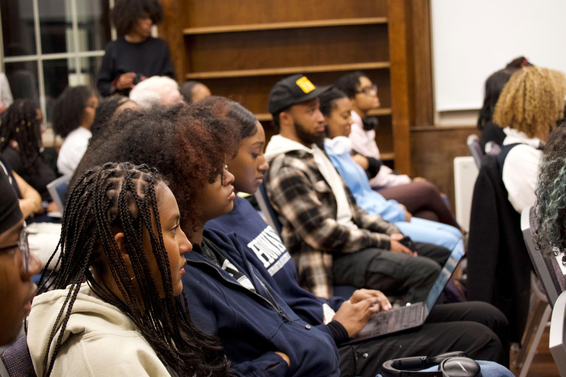 Students listen and take notes during Stacey Abrams' conversation on how to move forward from the 2024 presidential election. (Photo: Simone Boyd)