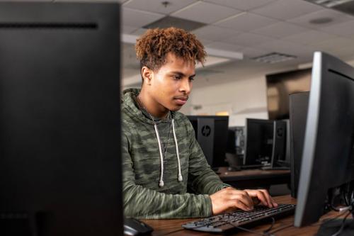 Student at Computer Workstation