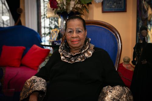 Eleanor Traylor, PhD, sitting in her home