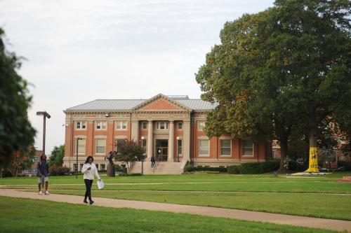 Female students walks on Howard University's campus