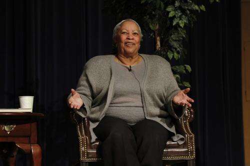 Toni Morrison giving a presentation while seated.