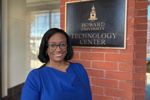 Andrea Simpson stands in front of Howard University technology center