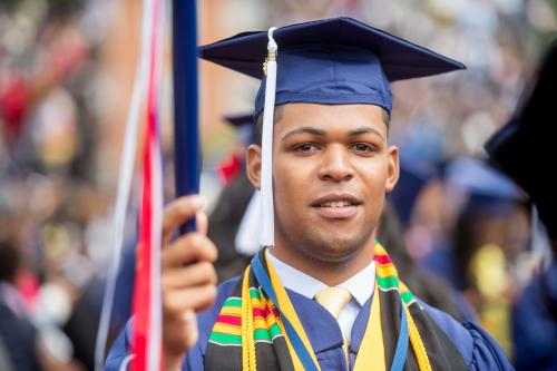 Howard University graduate at commencement ceremony
