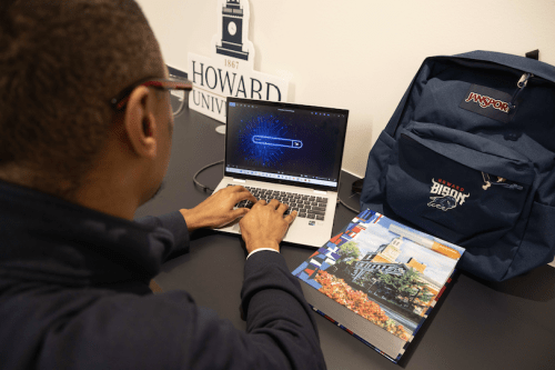 Student working with AI at Howard