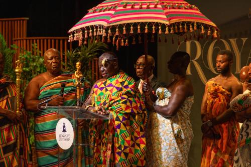 The Asantehene at Howard University's Cramton Auditorium dressed in colorful traditional Ghanian attire