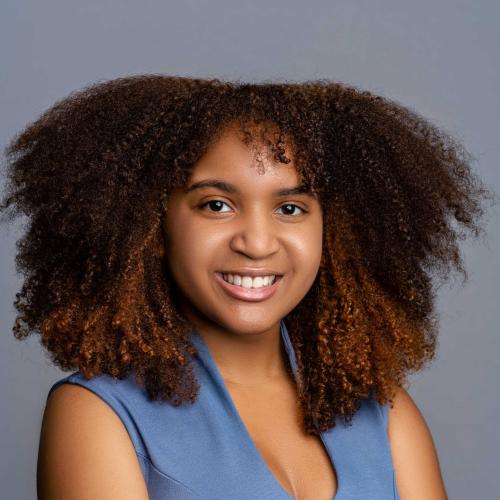 Ayanna Mann wearing a blue dress