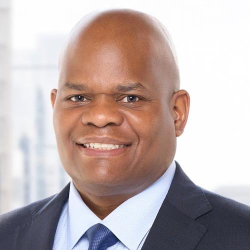 Levoyd E. Robinson Wearing a ligt blue shirt with blue tie