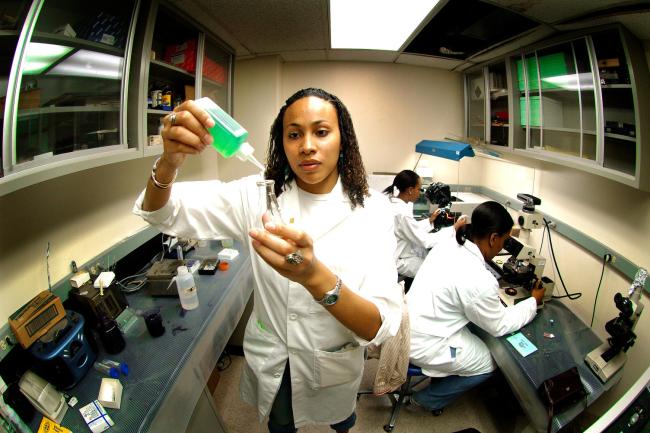 Howard University student in lab.