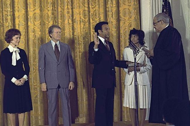 Ambassador Andrew Young is sworn in by fellow Howard alumnus Supreme Court Justice Thurgood Marshall.
