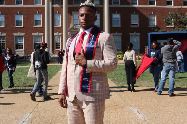 Student Ronald Whitmore in front of founders