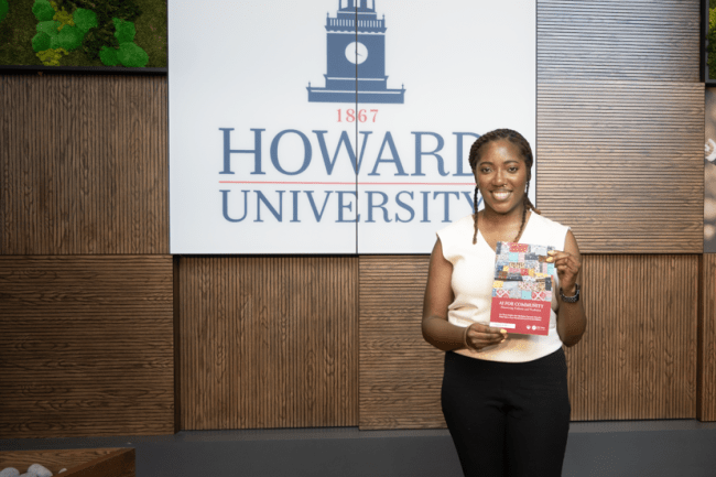 Lucretia Williams with the book she co-authored, "AI For Community"