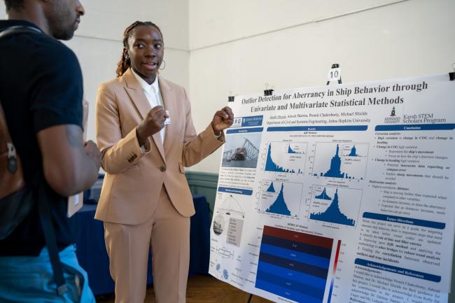 Jaydn Decuir at a research symposium