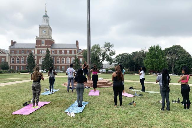 Yoga event happening on Howard University's campus grounds