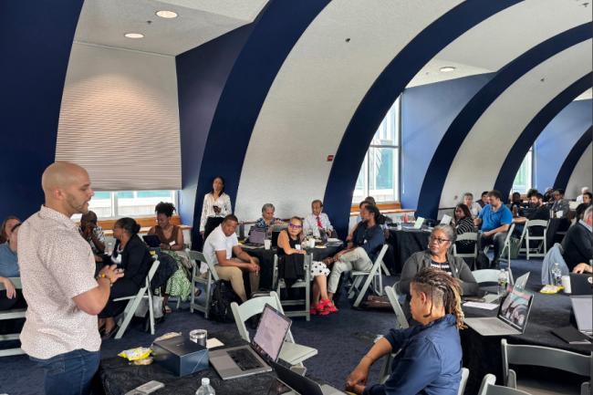 Faculty and staff gathered at Louis Stokes Health Sciences Library for AI workshop session