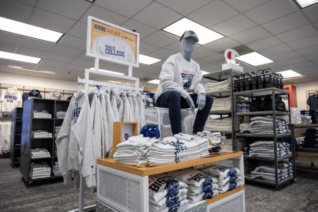 Merchandise at the Bison Exchange Campus Store with a mannequin wearing Howard University clothing