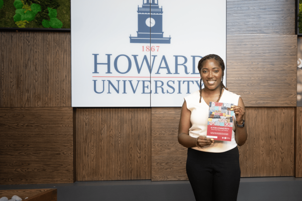 Lucretia Williams with the book she co-authored, "AI For Community"