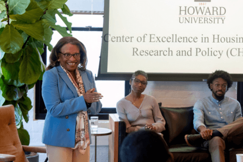 Secretary Todman speaks to student researchers at Howard.