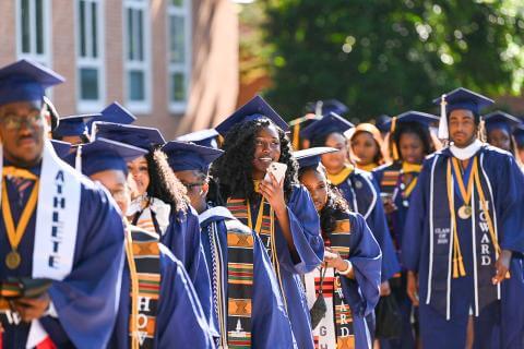 Graduates wait to process into Commencement