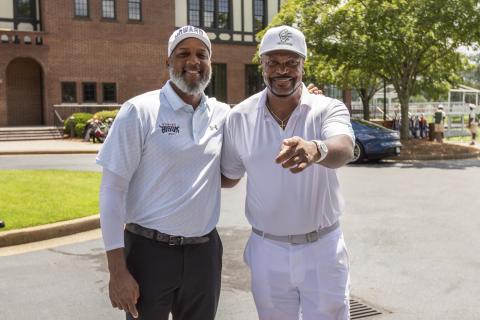 Howard University Director of Golf Sam Puryear and actor Chris Tucker