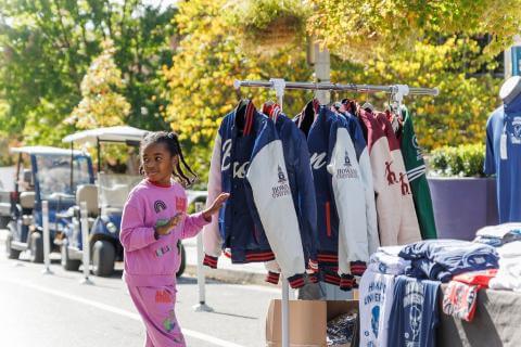 Homecoming_young person shopping on the Yard