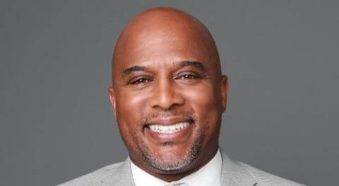 Johnnie Watson smiling at the camera