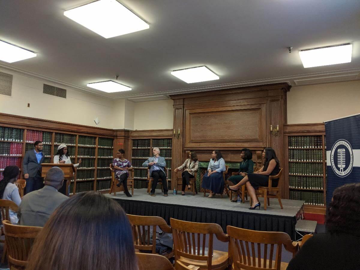 Symposium Attendees on Stage