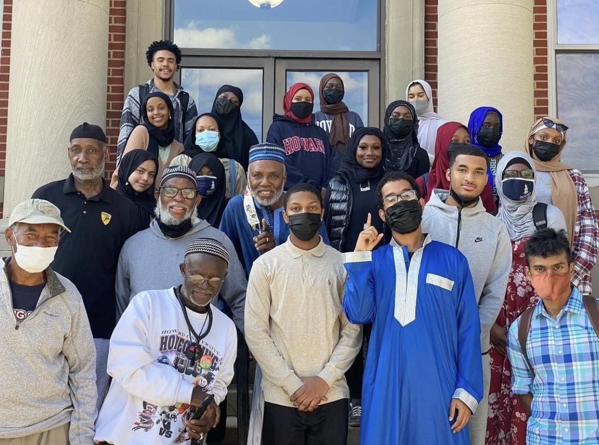 Howard Muslim Students Association standing on stairs