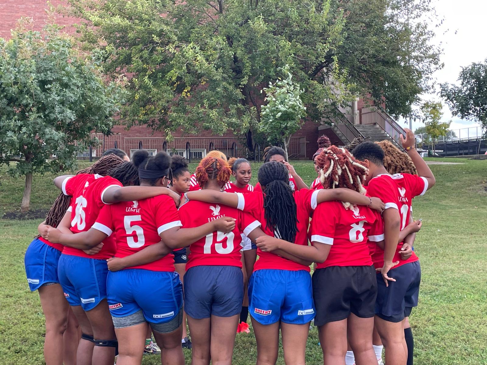 Howard rugby team in scrum