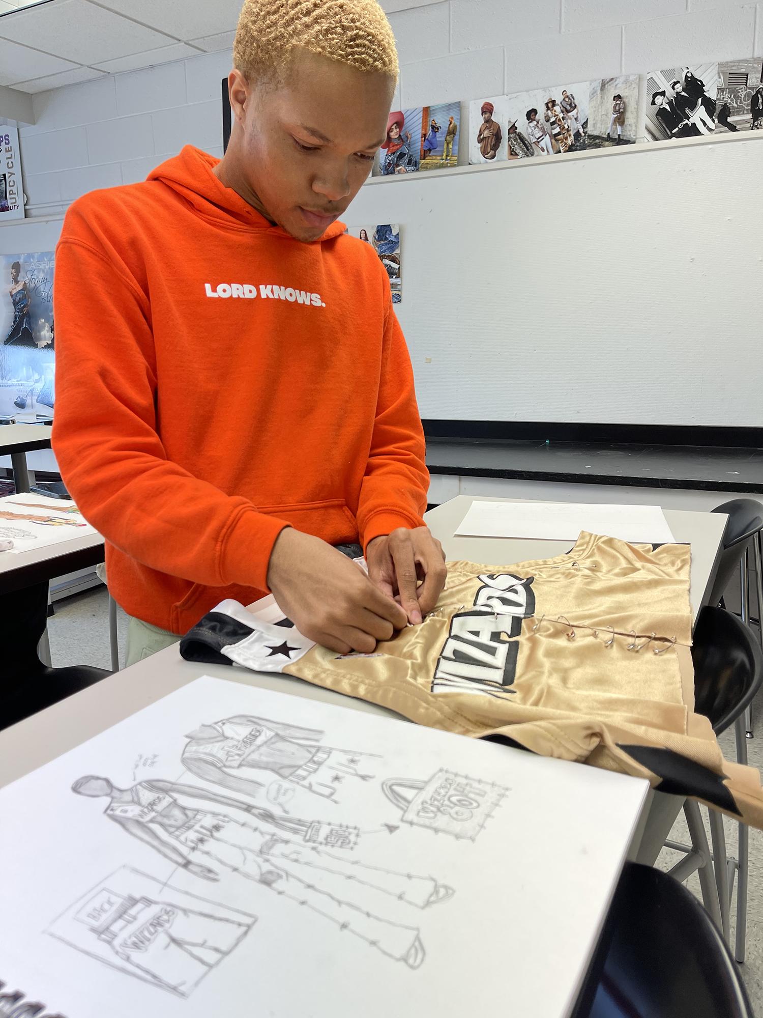 student working on Washington Wizards remix fashion project