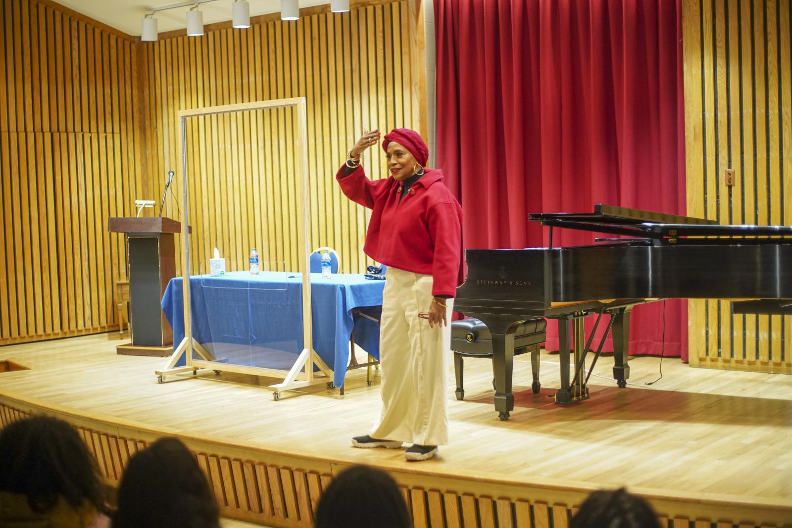 Jenifer Lewis talks with students at the Chadwick A. Boseman College of Fine Arts before signing copies of her new book, "Walking in My Joy: In These Streets" Chris Campbell/Howard University