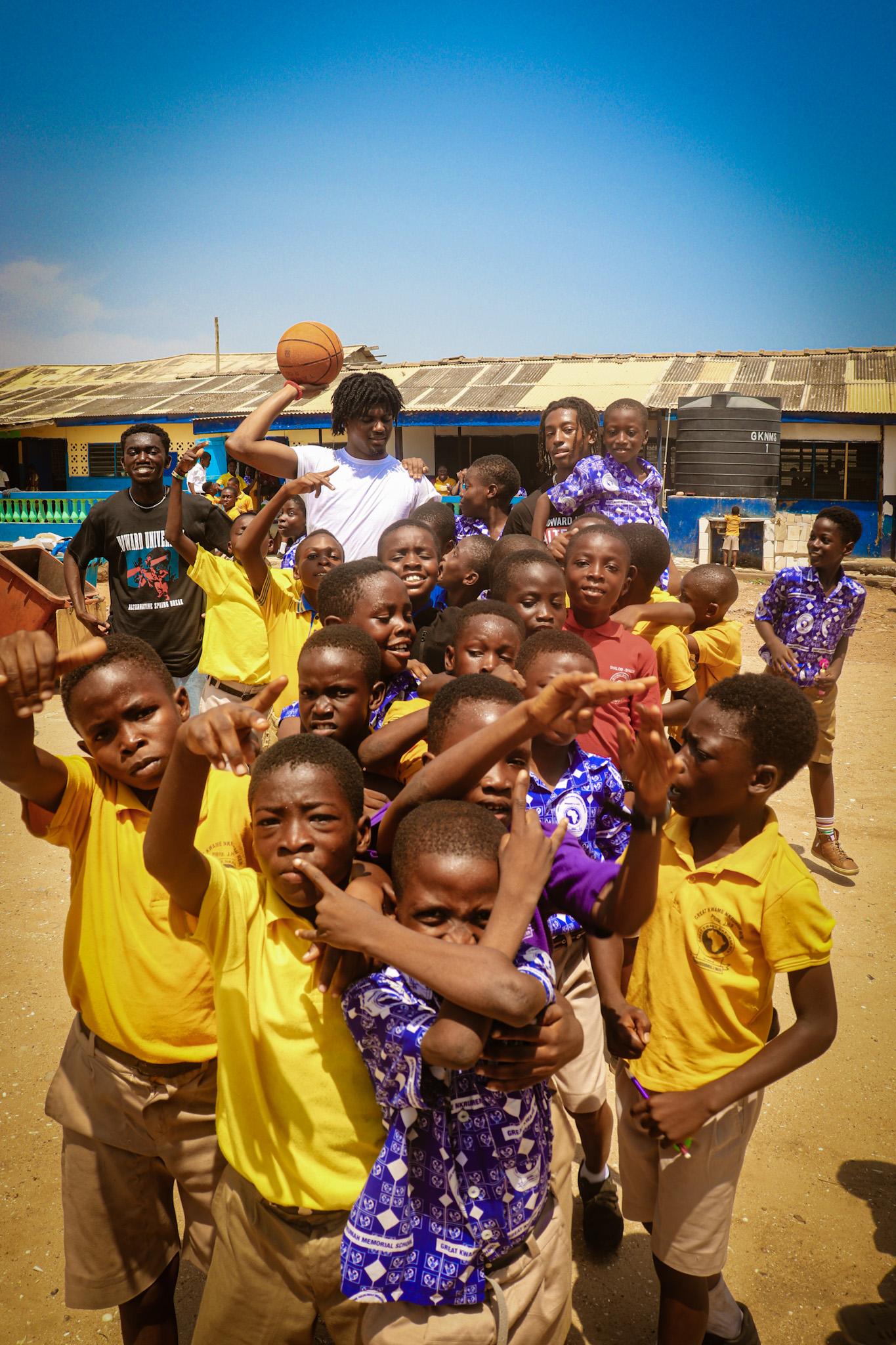 As some of the Howard Students were playing basketball with the students at Kwame Nkrumah Memorial School, they all took a quick break to pose in front of my camera as I was walking around the campus. The students in this picture include (from left to right): Gideon Boadu, Sophomore, Class of 2025; Eric January, Senior Class of 2023; Jeremy Felix, Freshman, Class of 2026.