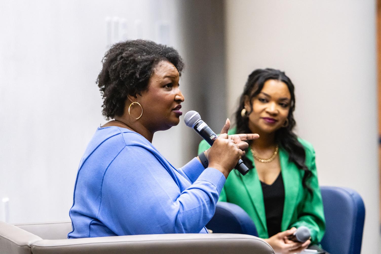 Stacey Abrams and Tia Dickerson speak at the first appearance of Abrams role as the race and politics chair. Latrel Caton
