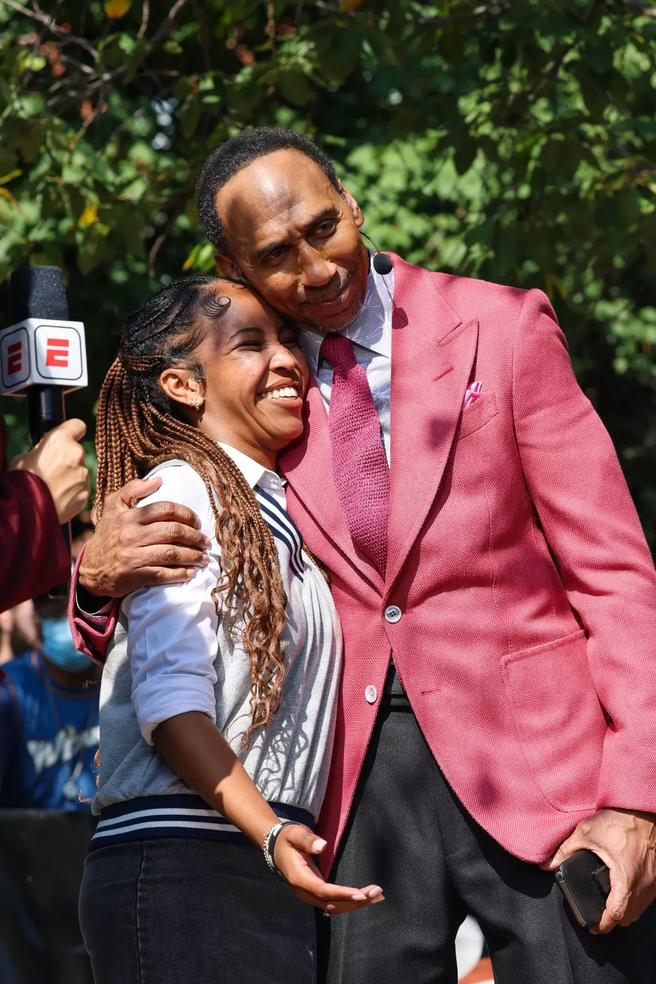 Junior broadcasting major Bailey hugs Stephen A. Smith after they reunite from an interview she conducted at five years old. (Photo by Jalisa Fulwood)