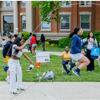 Students jump rope on the Yard at Howard.