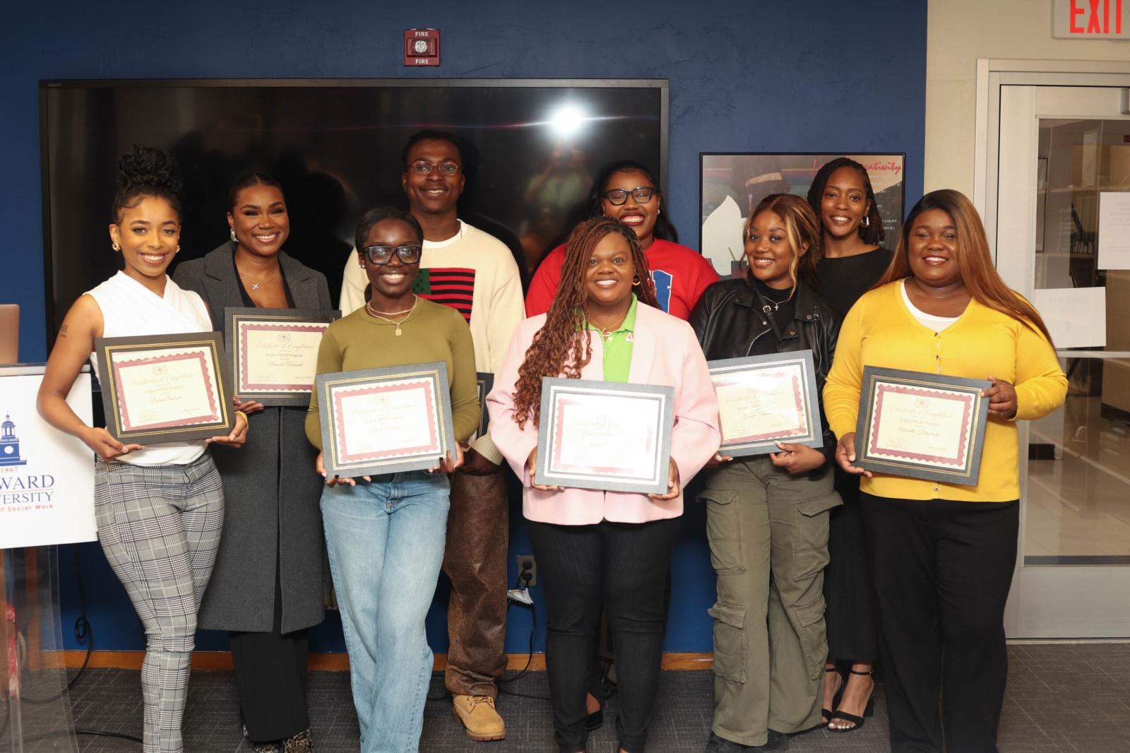 Sandra Jeter (second from right) and the Project PRESS cohort holding their degrees