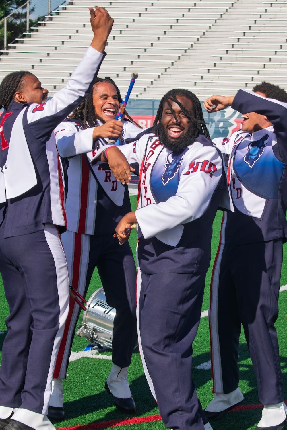 Howard Showtime Band members dance on football field