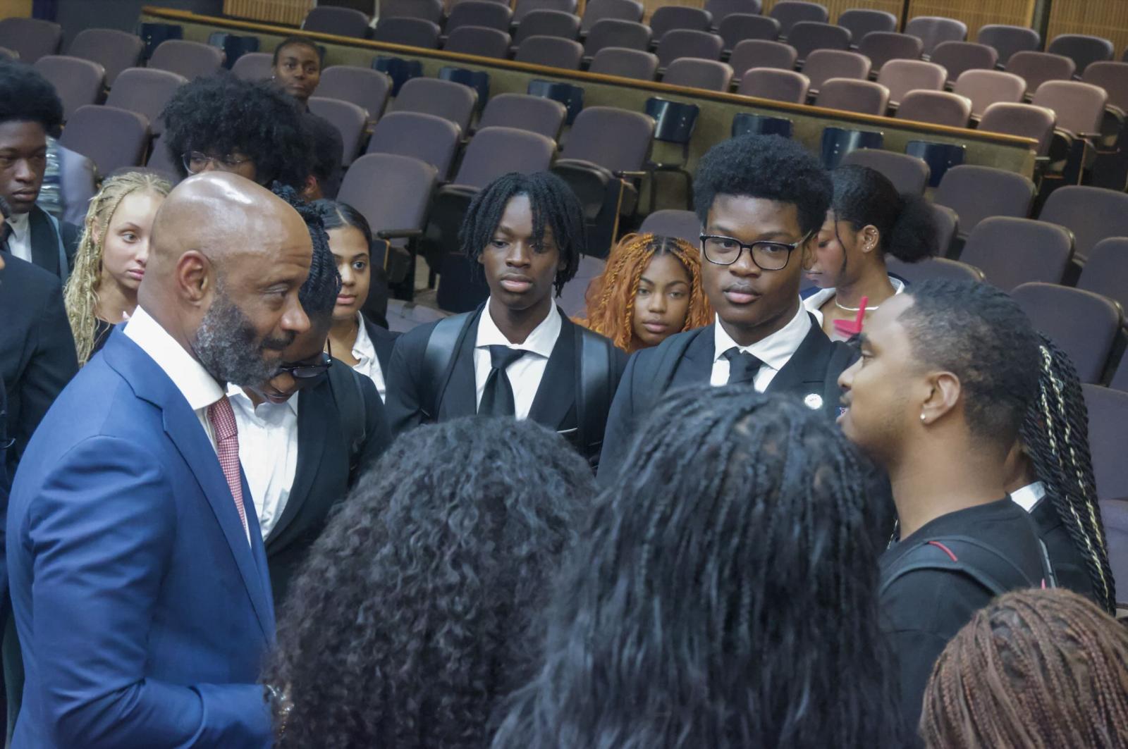 Mason with business students