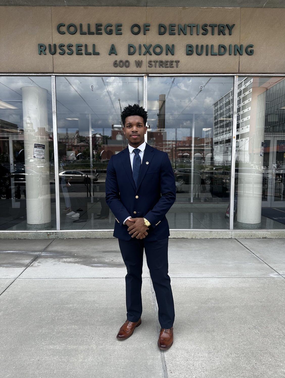 Godwin in front of Dixon Building