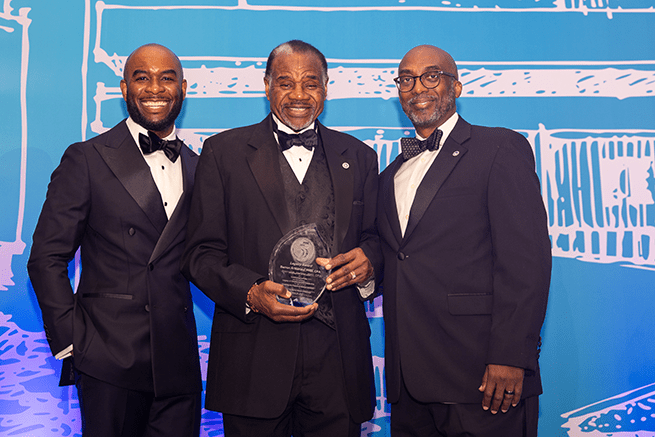 Dean Emeritus Harvey presented with legacy award by Lloyd Freeman and Dean Wilbon