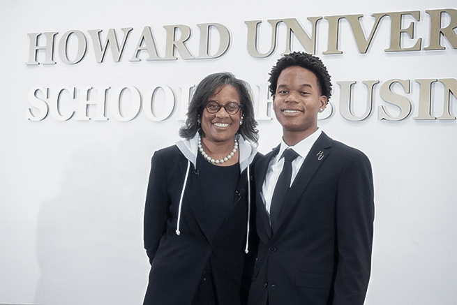 Dr. Hale and Darin Weatherhead posing with pin during lecture series