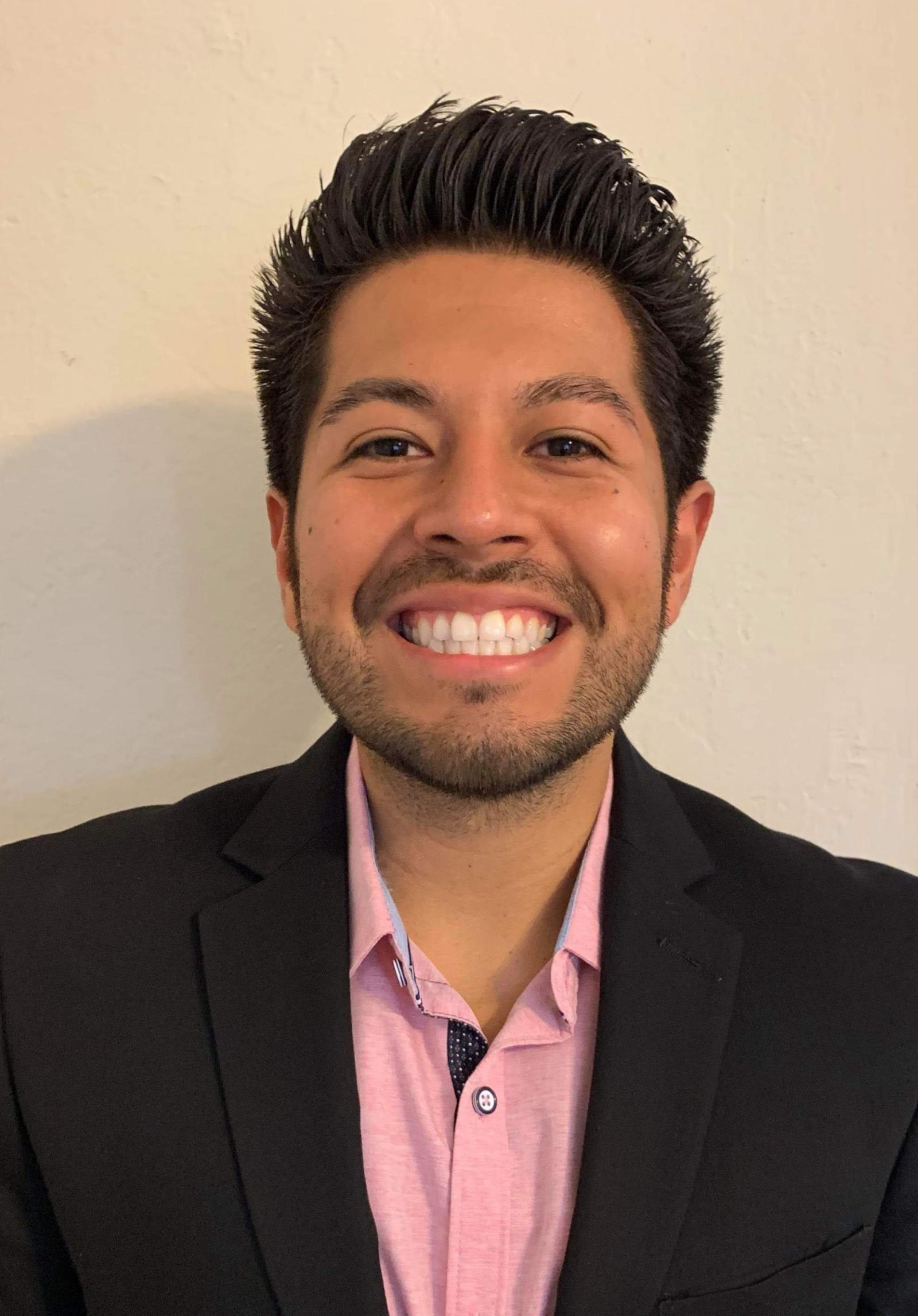 A man smiling at the camera