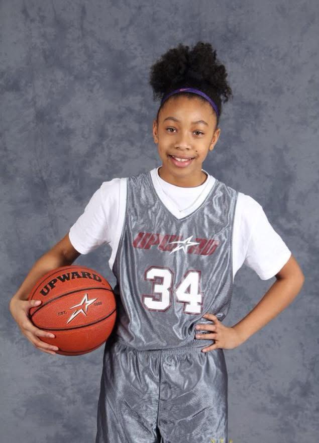 Zennia Thomas Childhood Basketball Photo 